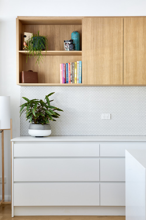 Elevating Small Kitchen Ideas: White Penny Tile Backsplash and Two-Tone Cabinetry