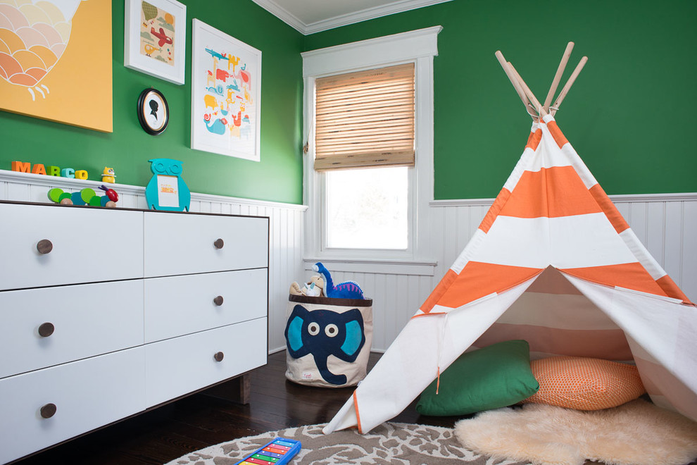 Inspiration for a transitional gender-neutral kids' room in New York with green walls and dark hardwood floors.