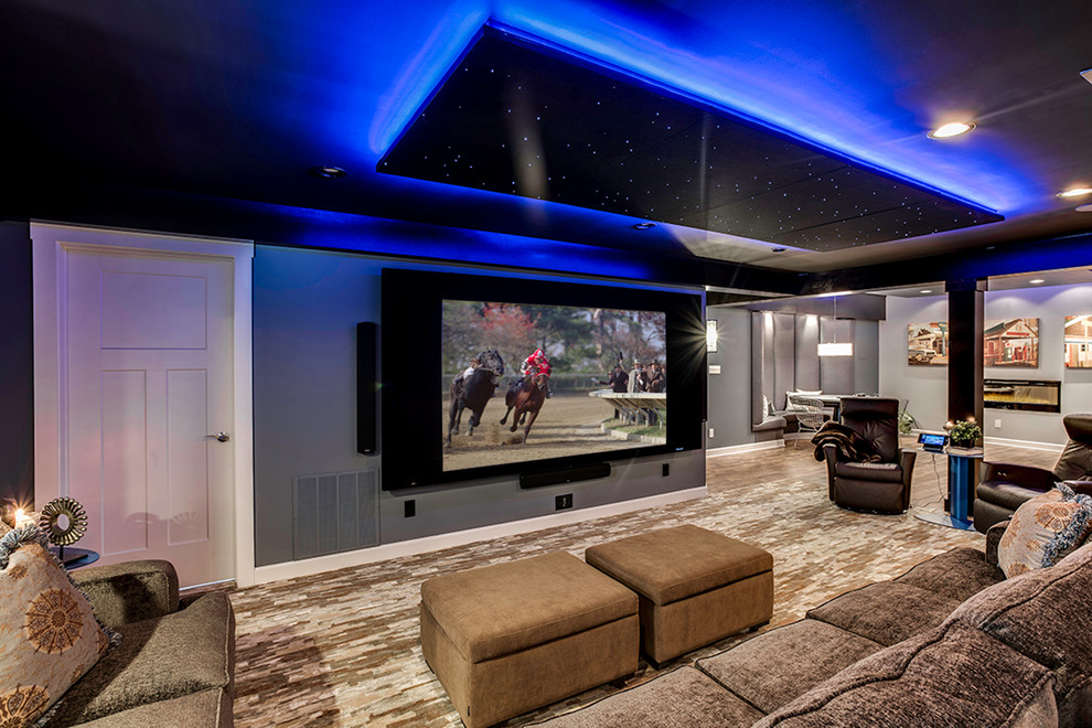 Inspiration for an expansive contemporary open concept home theatre in Baltimore with beige walls, carpet and a projector screen.