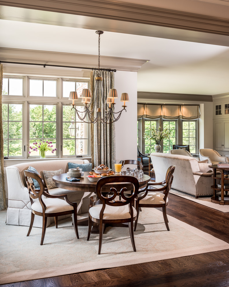 This is an example of a large traditional open plan dining in Wilmington with beige walls, dark hardwood floors, no fireplace and brown floor.