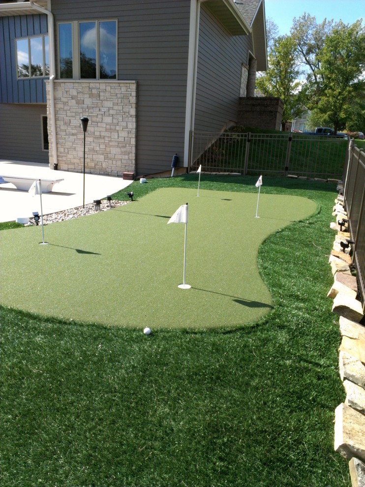 Design ideas for a traditional backyard outdoor sport court in St Louis.