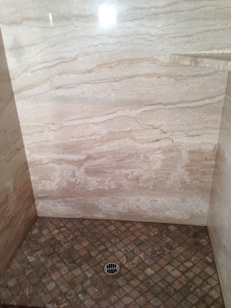 What product should I use to seal marble shower walls?