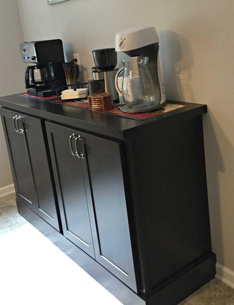 Inspiration for a mid-sized transitional l-shaped limestone floor open concept kitchen remodel with a drop-in sink, shaker cabinets, dark wood cabinets, granite countertops, stainless steel appliances and an island