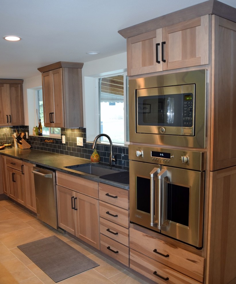 Example of a mountain style kitchen design in Denver