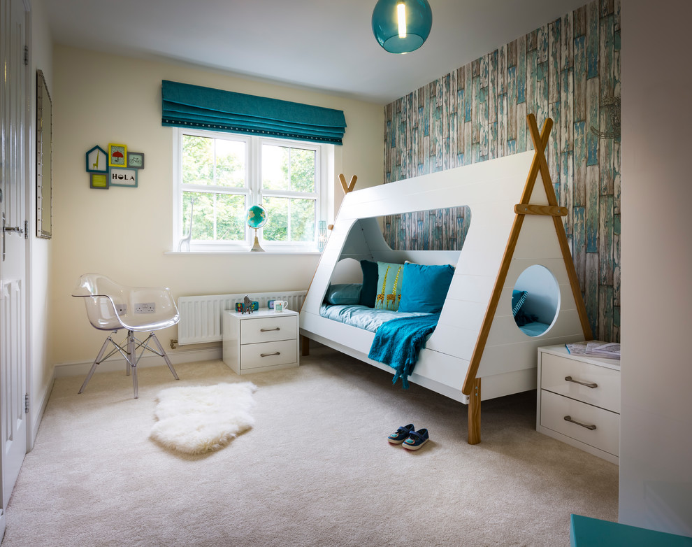Design ideas for a contemporary gender-neutral kids' bedroom for kids 4-10 years old in Other with blue walls and carpet.