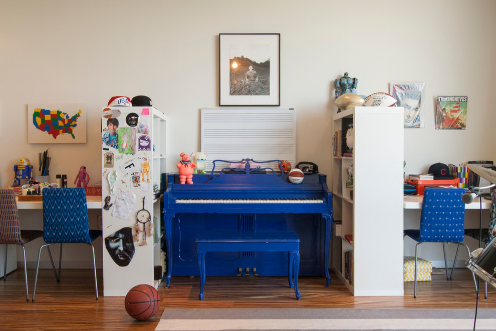 Inspiration for a large contemporary kids' room for boys in New York with white walls and medium hardwood floors.