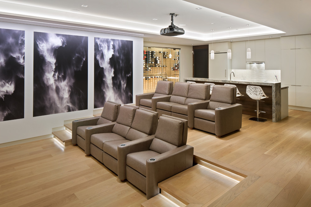 Inspiration for a contemporary home theatre in San Francisco with light hardwood floors.