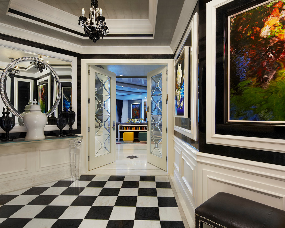This is an example of a mid-sized contemporary hallway in Miami with porcelain floors, multi-coloured floor and multi-coloured walls.