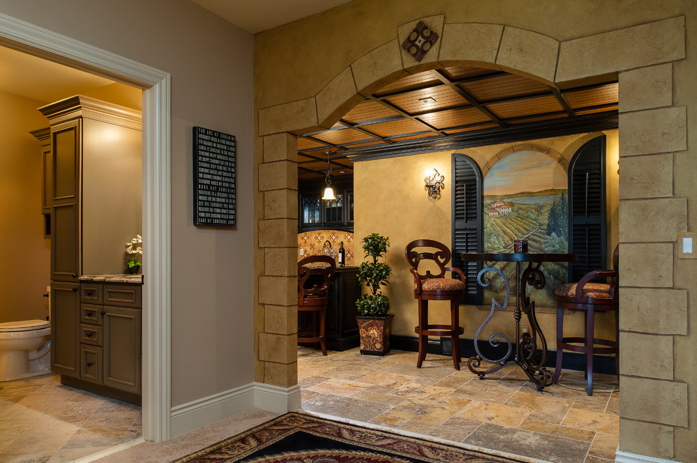 Photo of a traditional wine cellar in Other with slate floors.