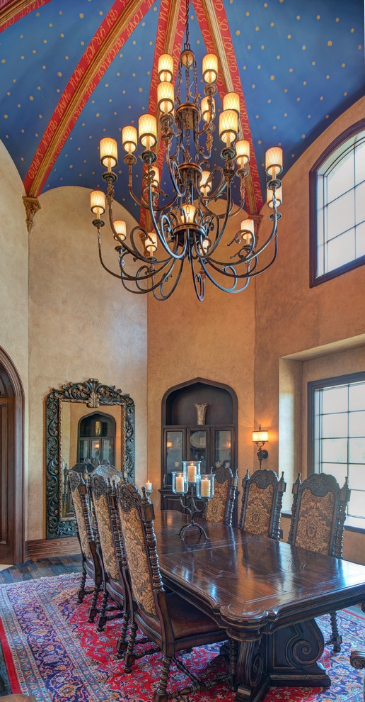 Photo of a large traditional separate dining room in Austin with beige walls, dark hardwood floors and no fireplace.