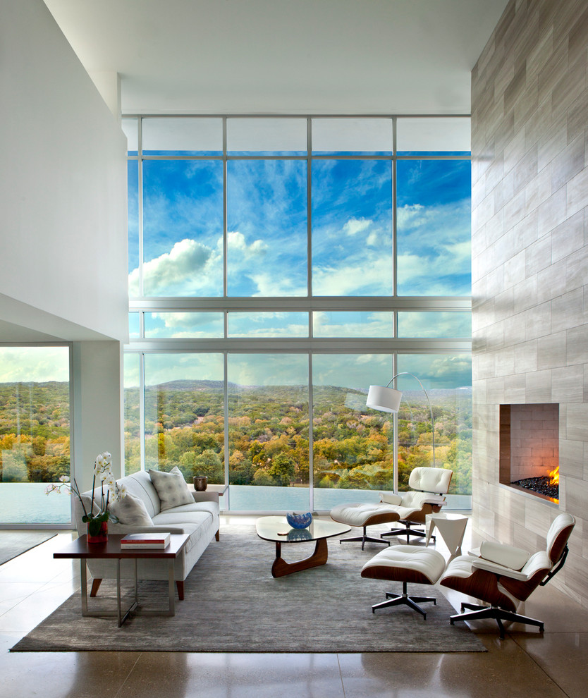 Inspiration for a contemporary open concept living room in Austin with a ribbon fireplace.