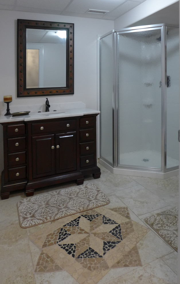 Bathroom - mid-sized transitional bathroom idea with furniture-like cabinets