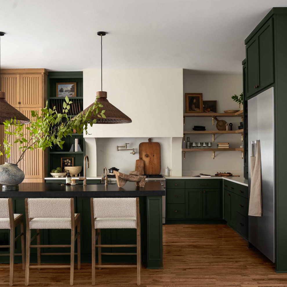 Inspiration for a large modern u-shaped eat-in kitchen in Dallas with shaker cabinets, green cabinets, stainless steel appliances, medium hardwood floors, with island, white benchtop and white splashback.