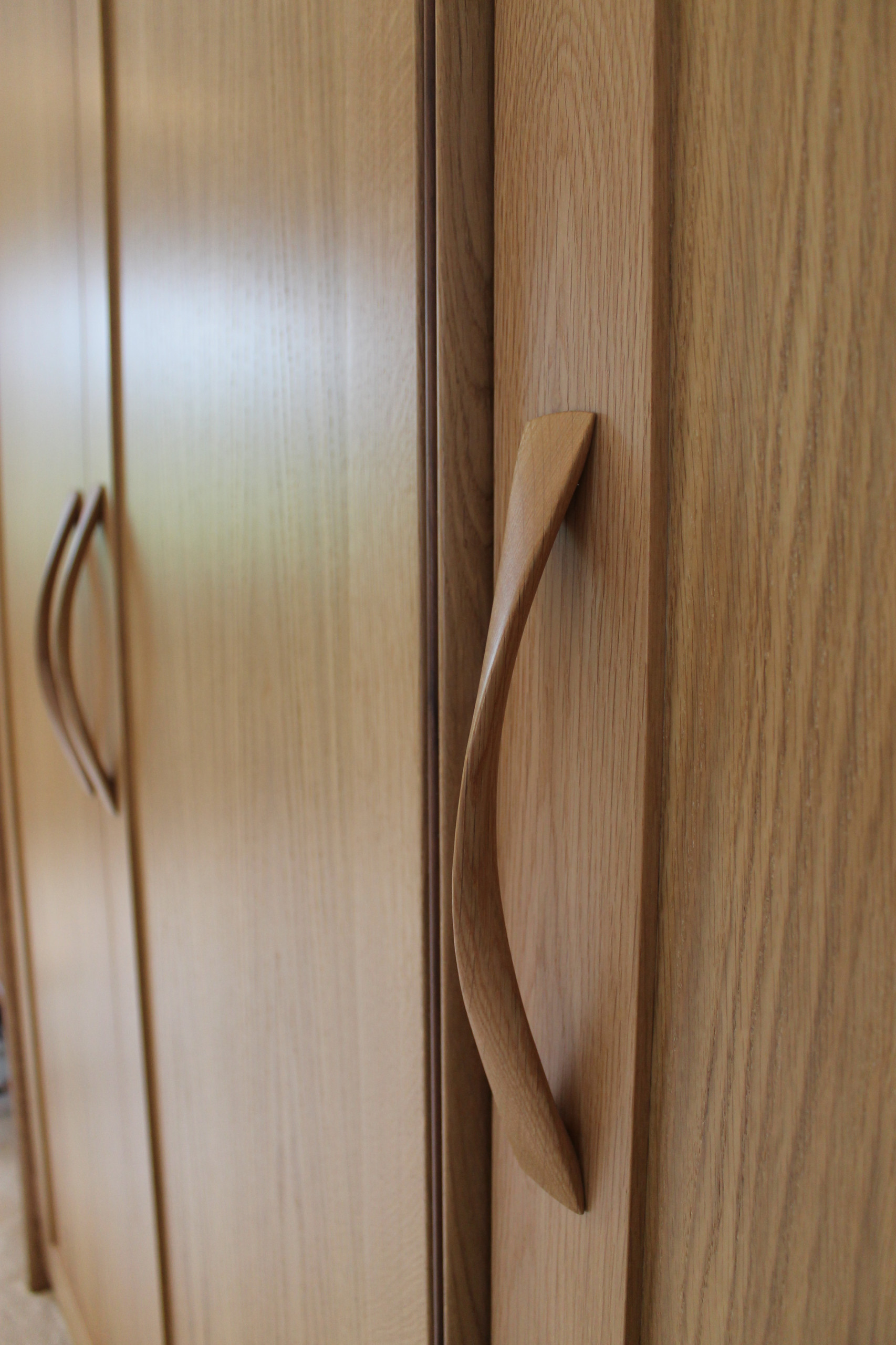 Oak and walnut fitted wardrobes