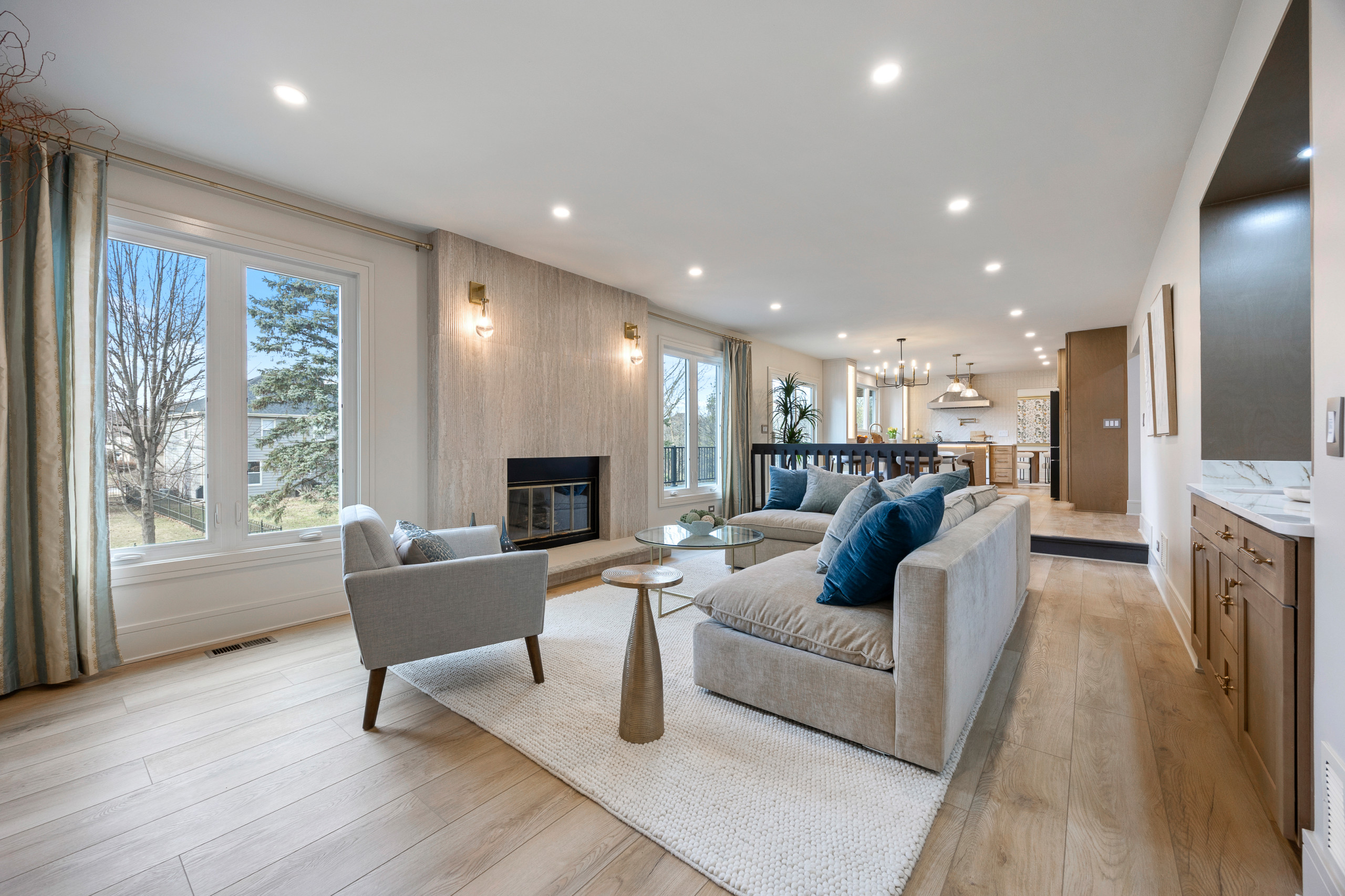 Family Room with Custom Fireplace and Wet Bar