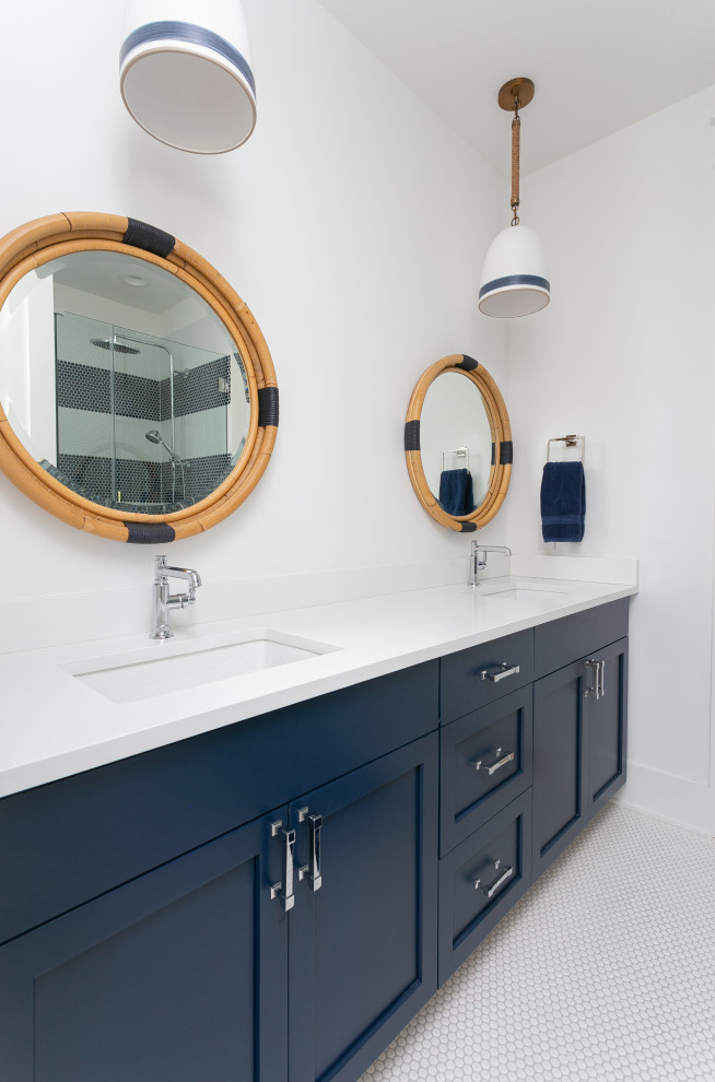 Inspiration for a mid-sized coastal kids' mosaic tile mosaic tile floor, white floor and double-sink corner shower remodel in Charleston with furniture-like cabinets, blue cabinets, a two-piece toilet, white walls, an integrated sink, a hinged shower door, white countertops and a built-in vanity