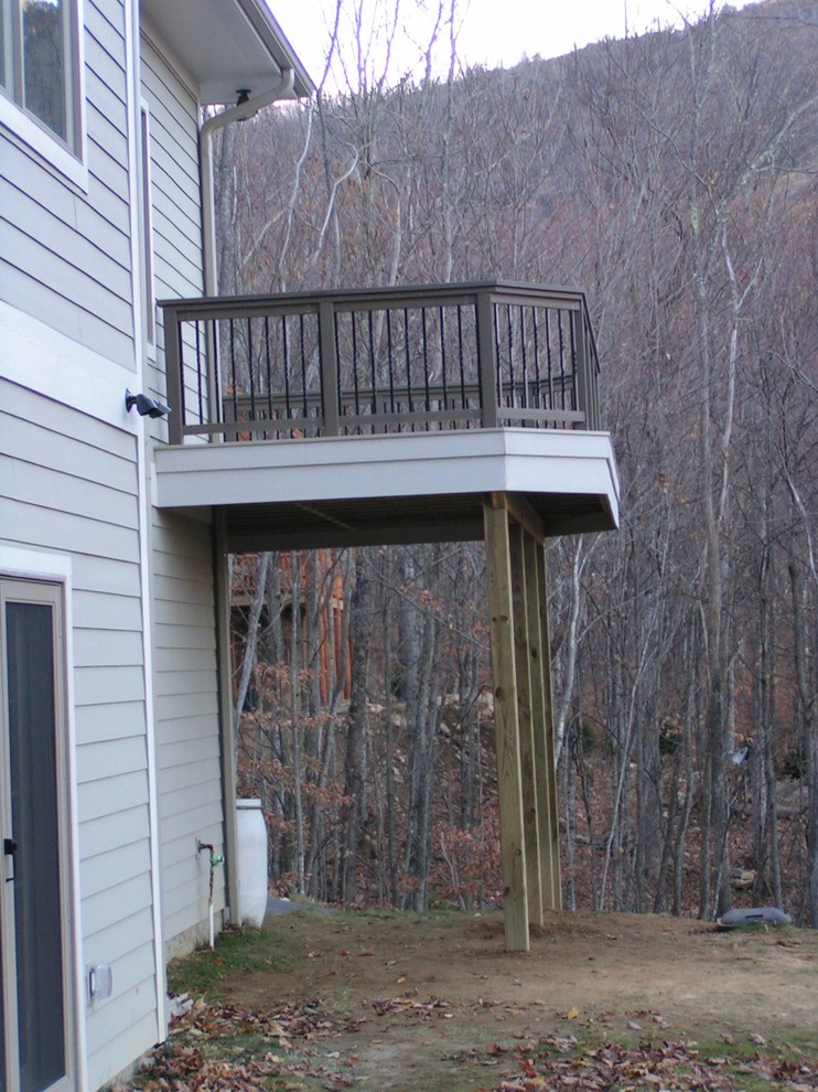 Photo of a mid-sized traditional balcony in Other with no cover.