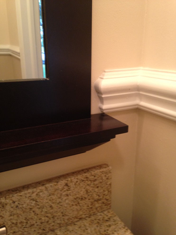 Example of a small transitional beige tile and porcelain tile porcelain tile home design design with an undermount sink, shaker cabinets, dark wood cabinets, granite countertops, a two-piece toilet and beige walls