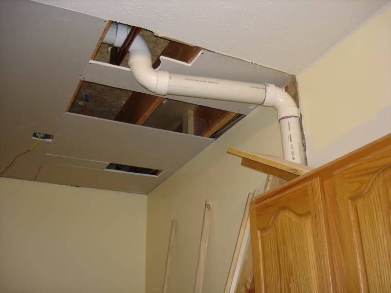 need ideas for disguising drain pipe