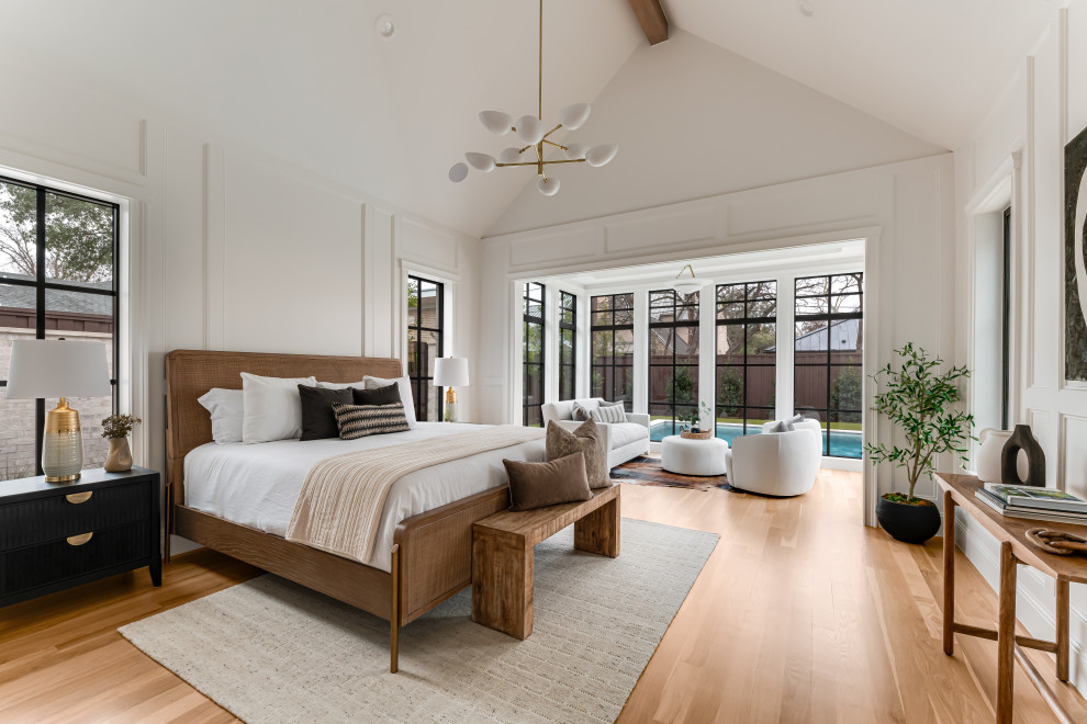 Example of a transitional bedroom design in Dallas