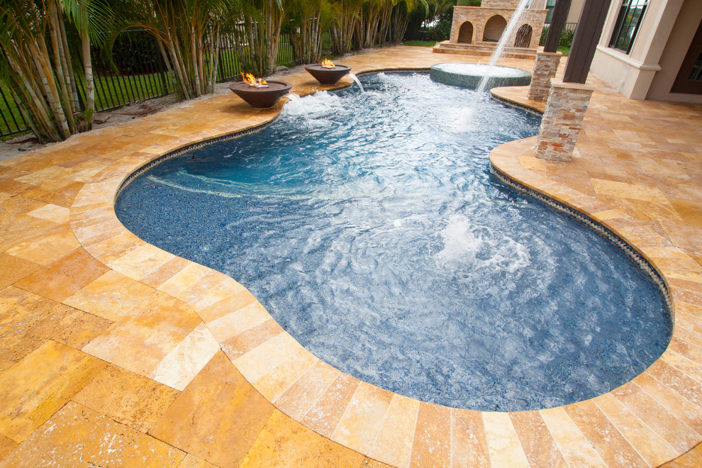 Custom Pool With Spa Sun Shelf And Pebble Tec Finish In Parkland