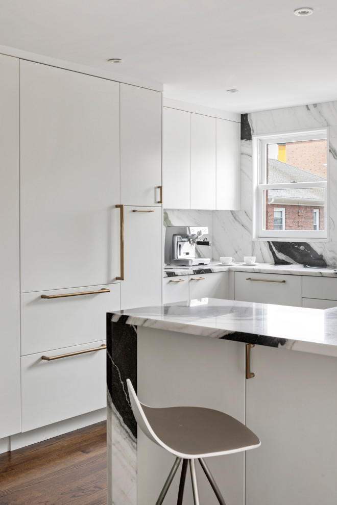 Mid-sized modern l-shaped eat-in kitchen in Boston with a single-bowl sink, flat-panel cabinets, white cabinets, marble benchtops, multi-coloured splashback, marble splashback, stainless steel appliances, medium hardwood floors, no island and multi-coloured benchtop.