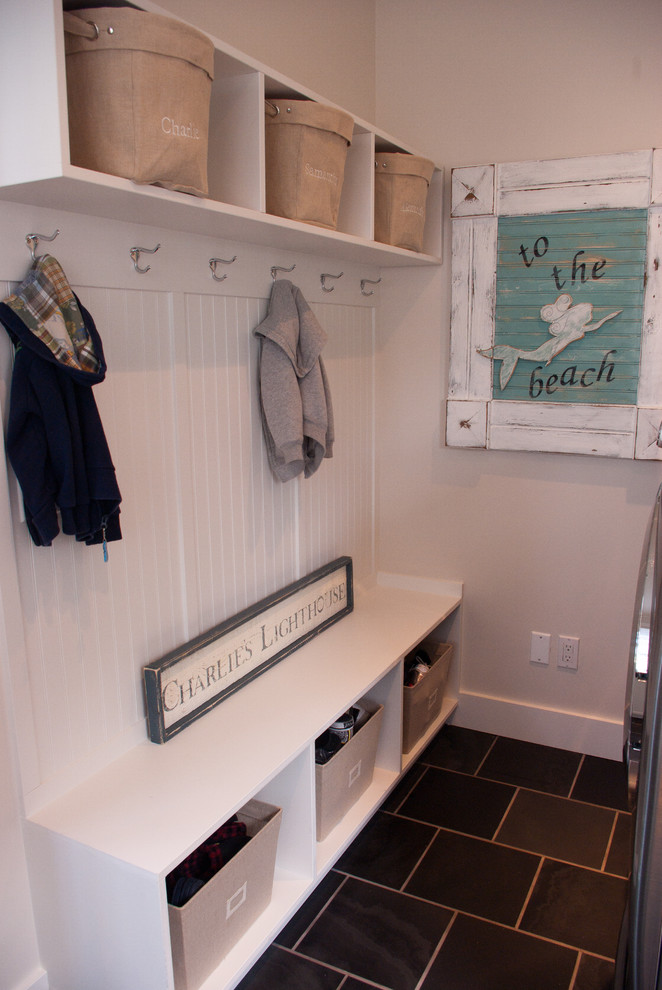 This is an example of a contemporary laundry room in Vancouver.