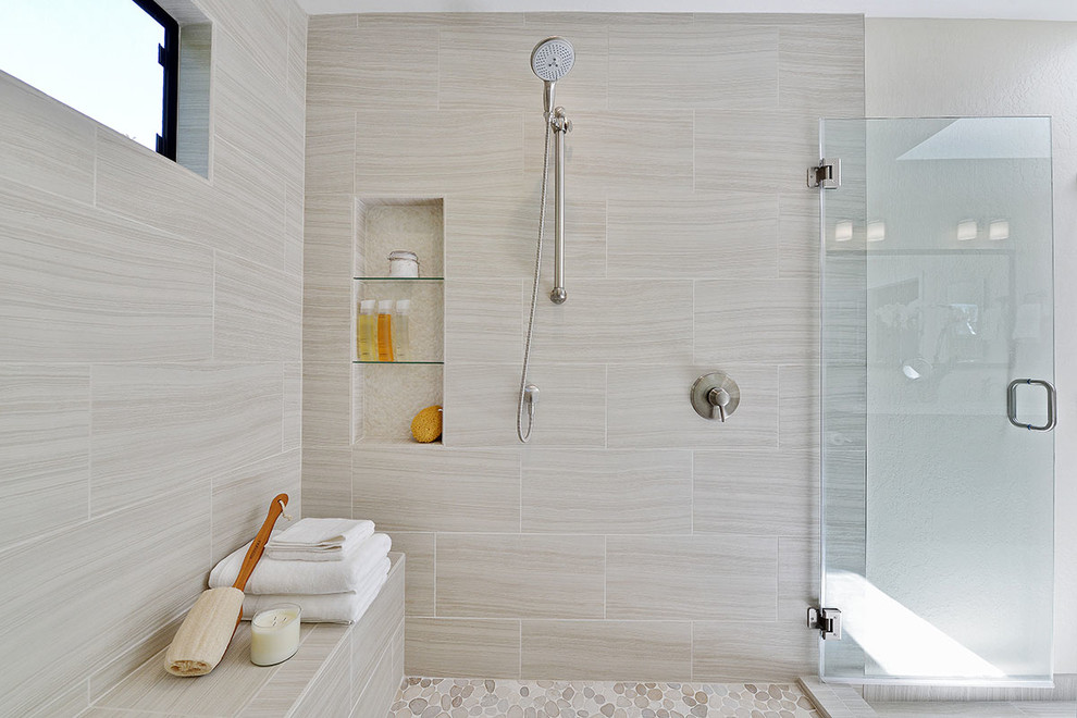 Mid-sized master wet room bathroom in San Francisco with shaker cabinets, black cabinets, an alcove tub, a two-piece toilet, beige tile, porcelain tile, beige walls, porcelain floors, an undermount sink, engineered quartz benchtops, beige floor and a hinged shower door.