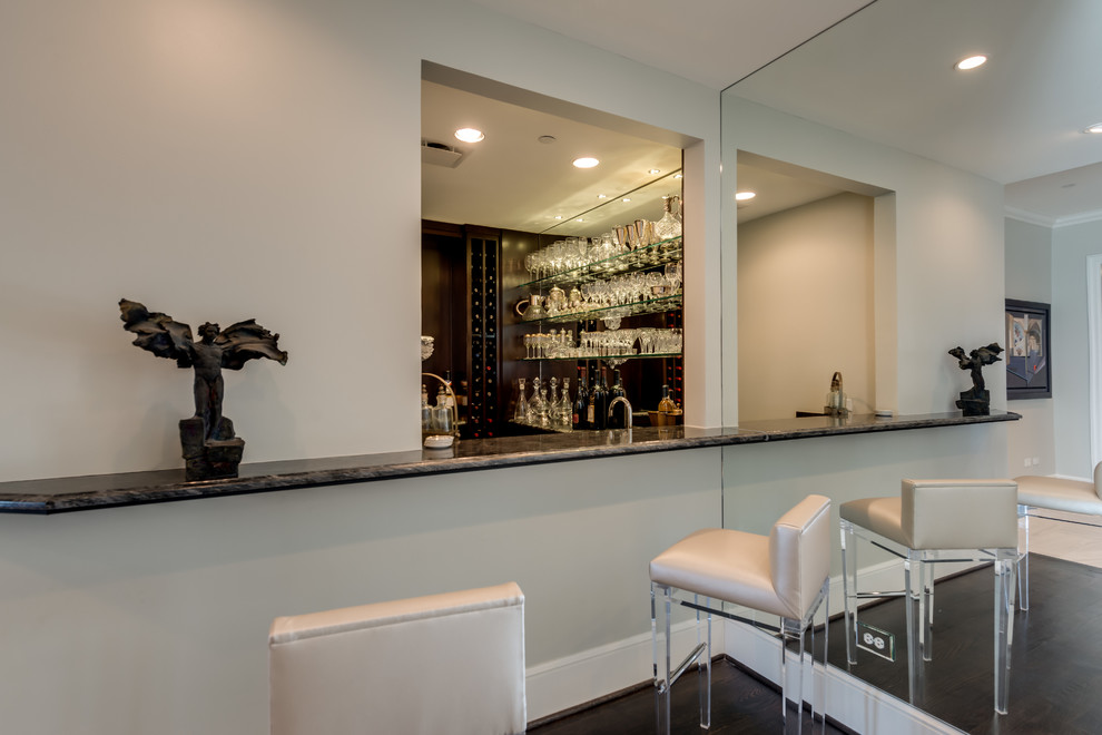 Design ideas for a transitional home bar in Dallas.