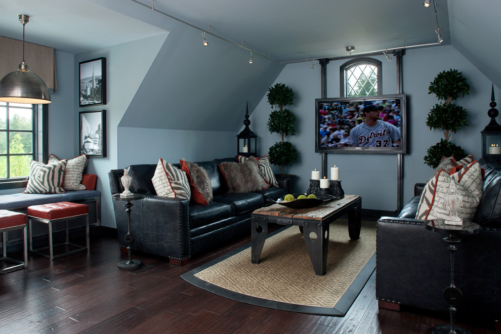 Inspiration for a contemporary family room in Detroit with grey walls, dark hardwood floors, a wall-mounted tv and brown floor.