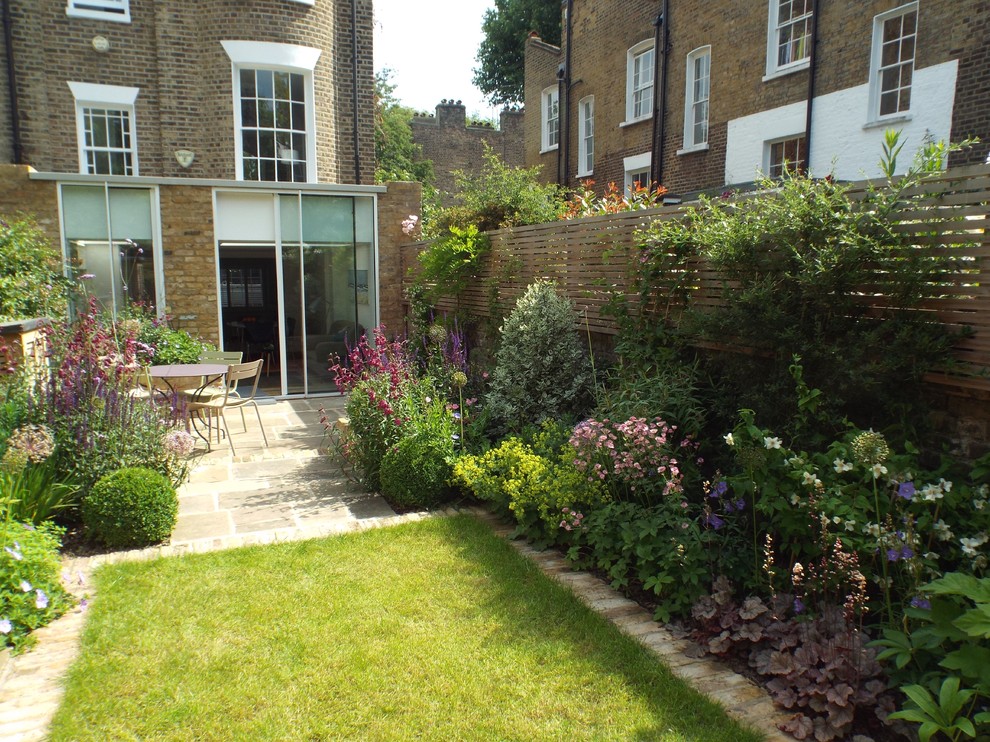 Inspiration for a small contemporary partial sun garden in London.