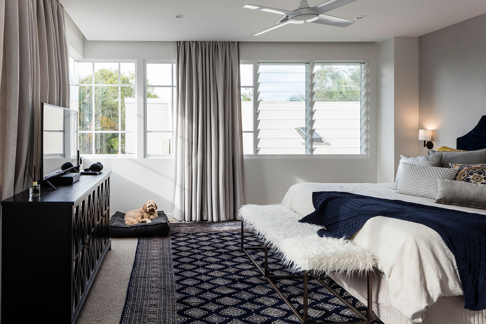 Design ideas for a beach style bedroom in Sunshine Coast with grey walls, carpet and grey floor.