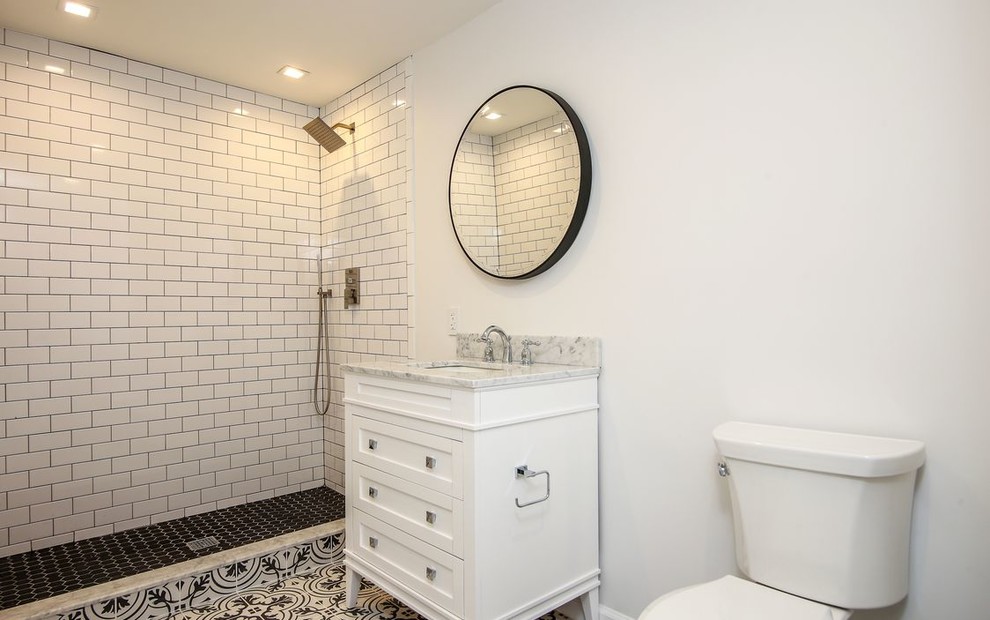 Design ideas for a large country bathroom in Miami with recessed-panel cabinets, white cabinets, a freestanding tub, an open shower, a two-piece toilet, white tile, marble, mosaic tile floors, an undermount sink, marble benchtops, black floor, an open shower and white benchtops.