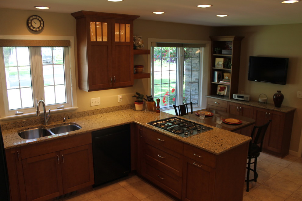 Inspiration for a mid-sized transitional u-shaped eat-in kitchen remodel with shaker cabinets, medium tone wood cabinets, quartzite countertops and a peninsula