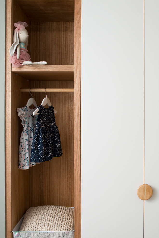 This is an example of a scandinavian kids' room in Hobart.