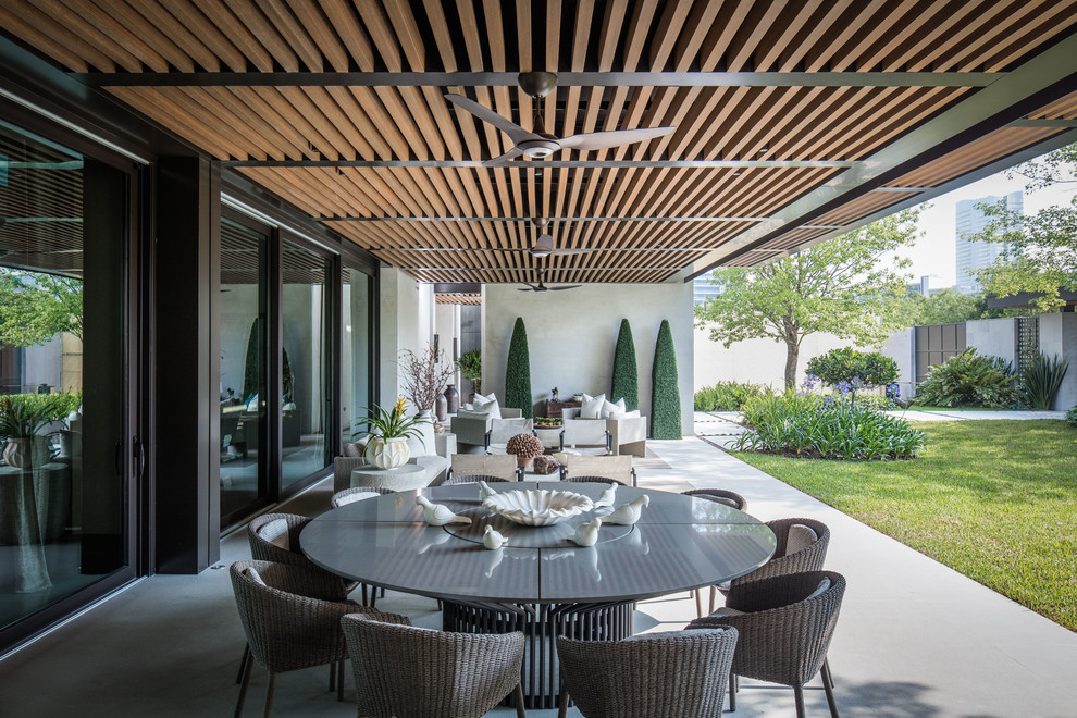 Design ideas for a contemporary patio with a pergola.