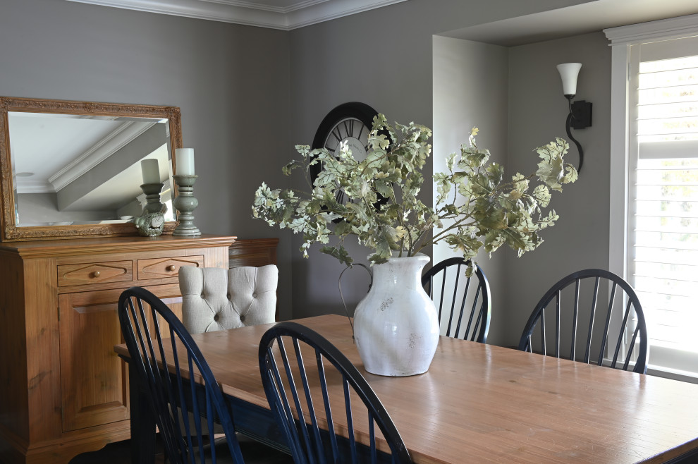Mid-sized transitional dining room photo in Vancouver with gray walls