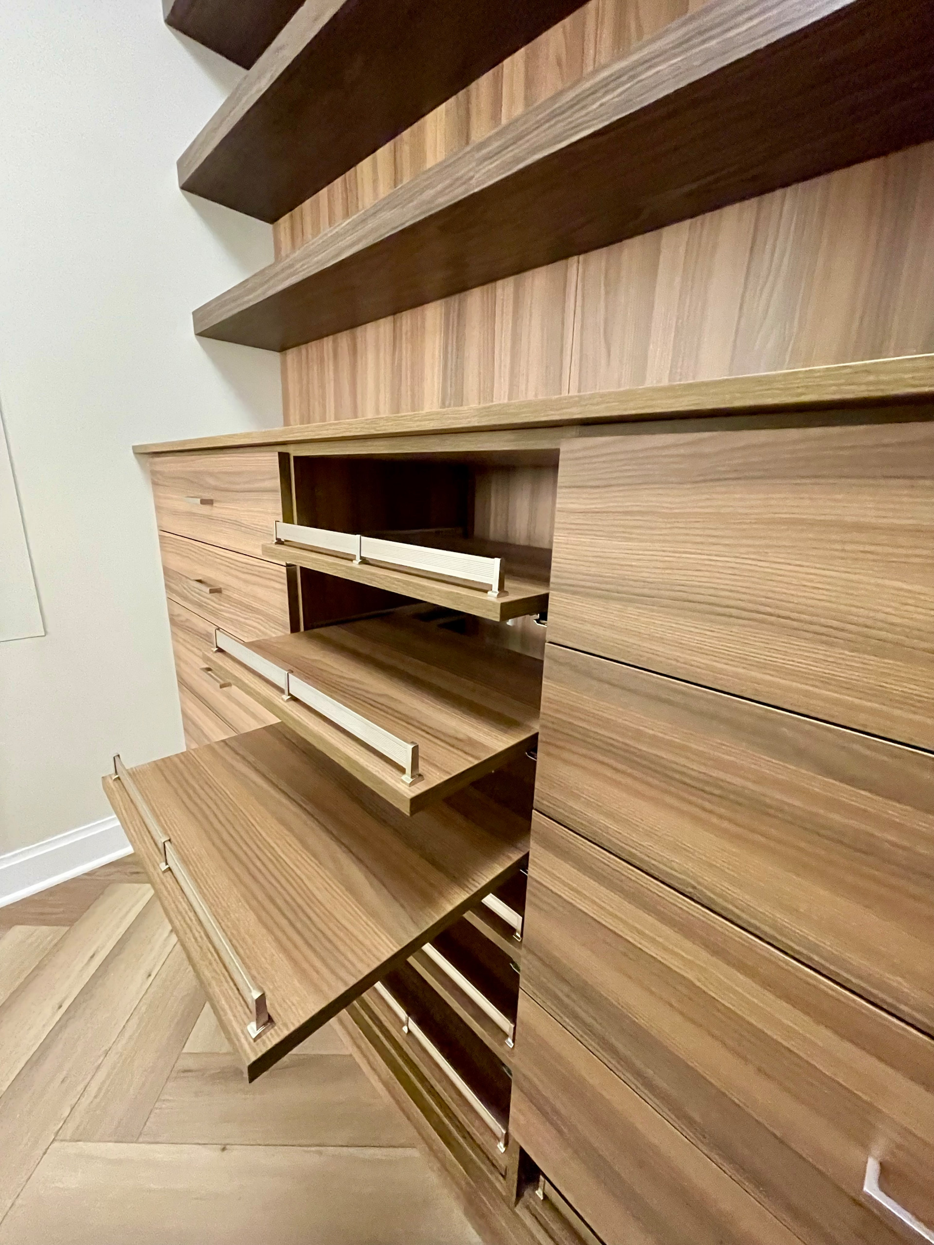 Modern Closet with Floating Shelves and Shoe Pullouts