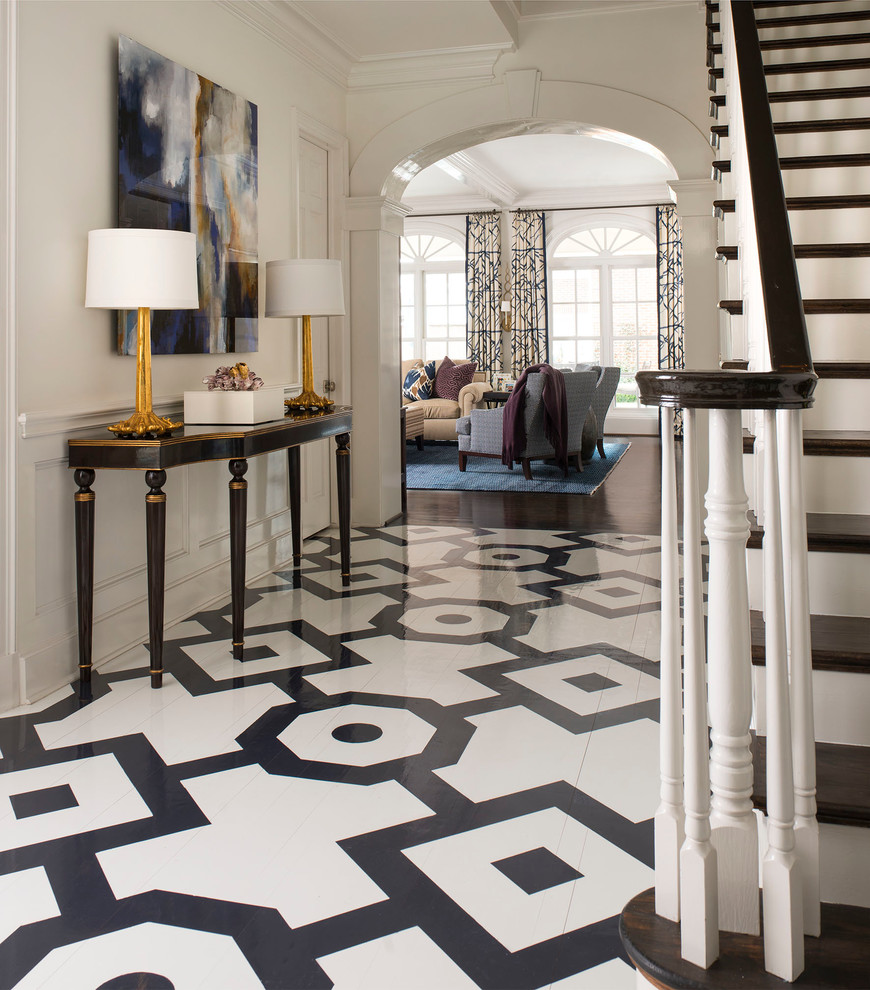 Inspiration for a traditional entryway in Dallas with white walls and multi-coloured floor.