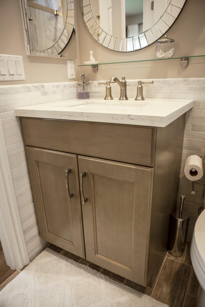 Design ideas for a small modern master bathroom in Los Angeles with shaker cabinets, beige cabinets, an alcove shower, a one-piece toilet, gray tile, an undermount sink, quartzite benchtops, a sliding shower screen, white benchtops, a single vanity and a built-in vanity.