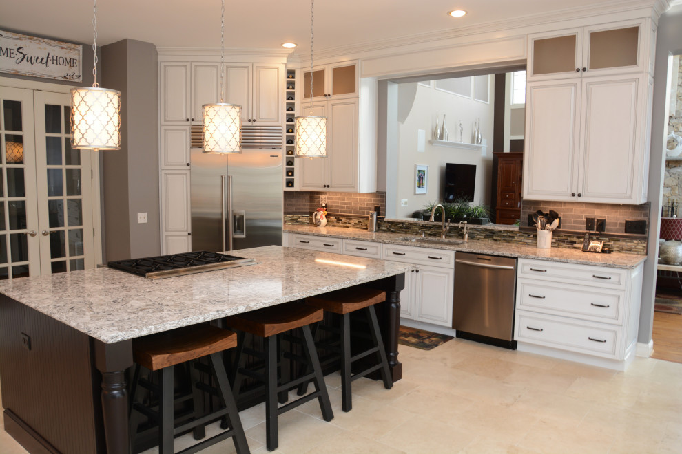 Inspiration for a large transitional u-shaped separate kitchen in DC Metro with a single-bowl sink, raised-panel cabinets, white cabinets, quartz benchtops, grey splashback, stainless steel appliances, with island, beige floor and beige benchtop.