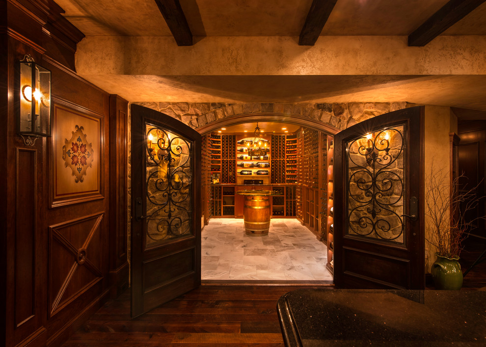 Mid-sized traditional wine cellar in DC Metro with limestone floors, storage racks and beige floor.
