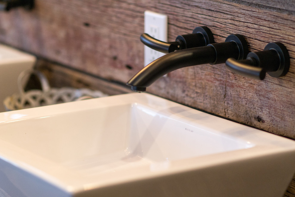 Bathroom - rustic bathroom idea in Toronto with wood countertops