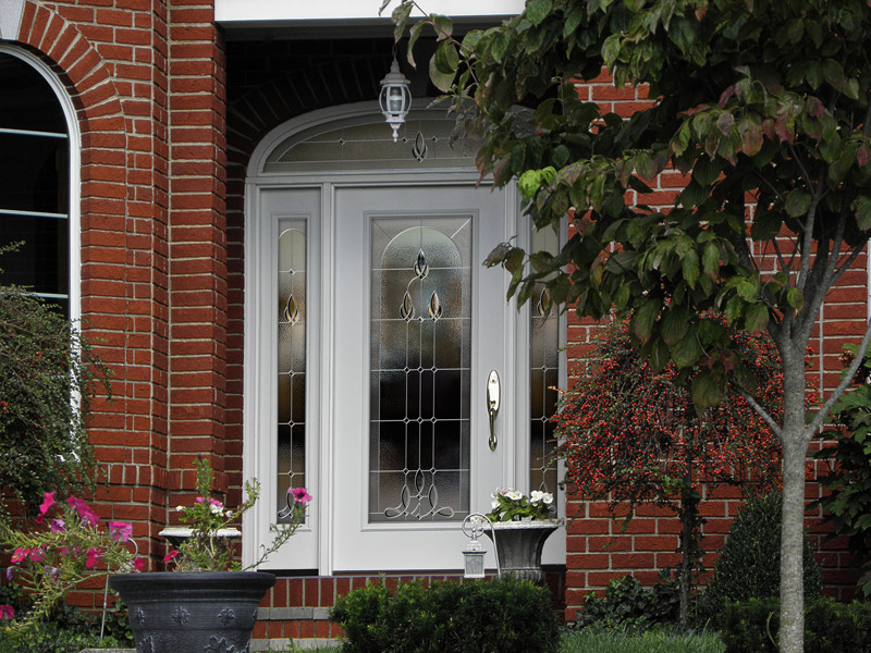Design ideas for a mid-sized traditional front door in Denver with a single front door and a white front door.