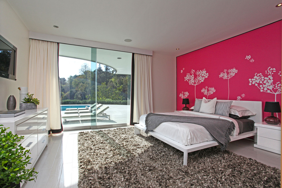 Midcentury bedroom in Los Angeles with painted wood floors.