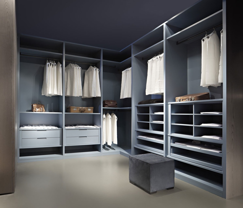 Inspiration for a small traditional gender-neutral walk-in wardrobe in Miami with recessed-panel cabinets, grey cabinets, vinyl floors and beige floor.