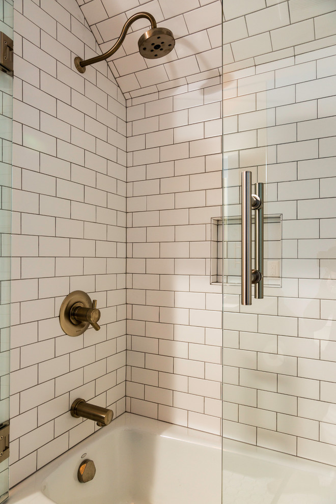 Contemporary master bathroom in Other with an alcove shower and white tile.
