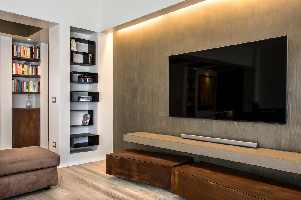 Inspiration for a large contemporary open concept home theatre in Rome with brown walls, painted wood floors and a built-in media wall.