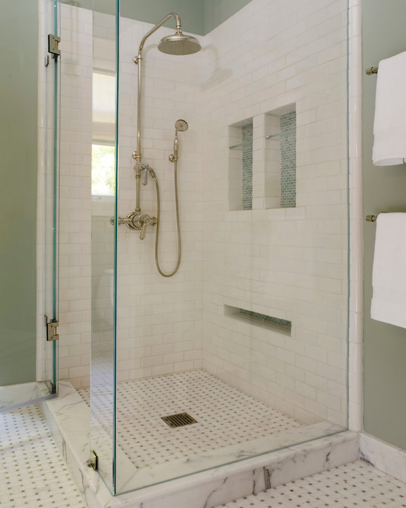 Design ideas for a mid-sized contemporary bathroom in San Francisco with a corner shower, white tile, stone tile, green walls and mosaic tile floors.