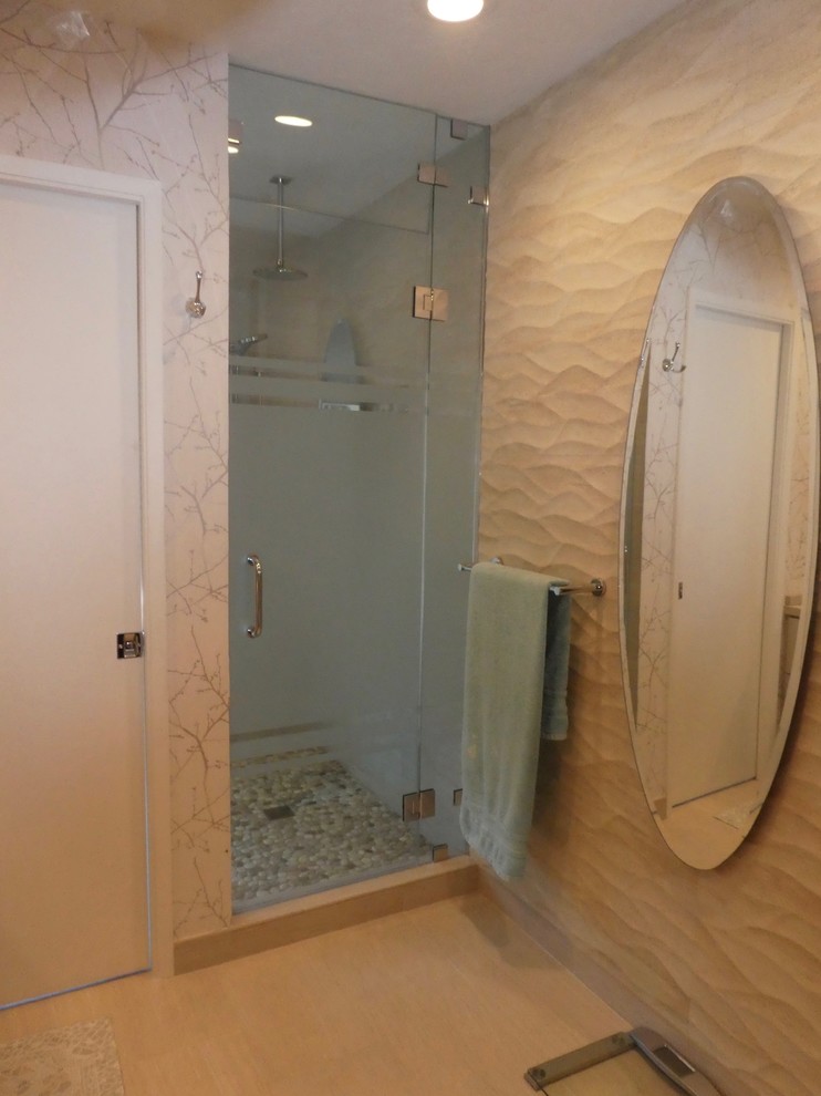 Inspiration for a mid-sized transitional master porcelain tile and beige floor alcove shower remodel with flat-panel cabinets, beige cabinets, beige walls, a vessel sink, quartzite countertops, a hinged shower door and beige countertops